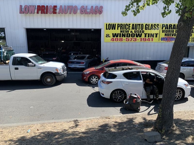 Exterior shop with vehicles parked outside