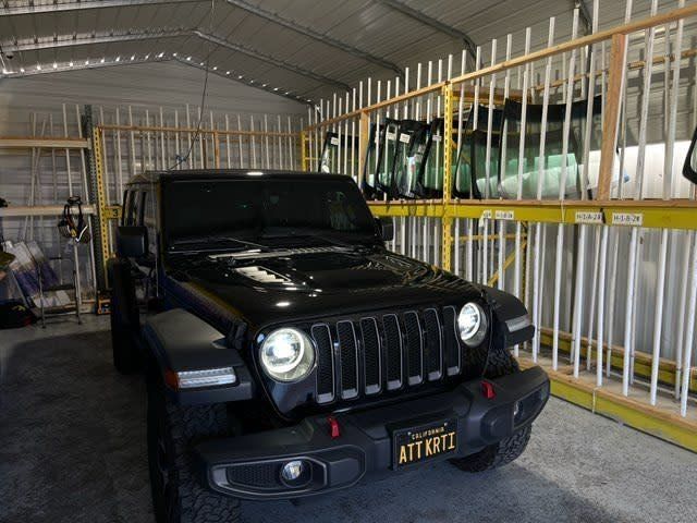 Car inside a storage shed