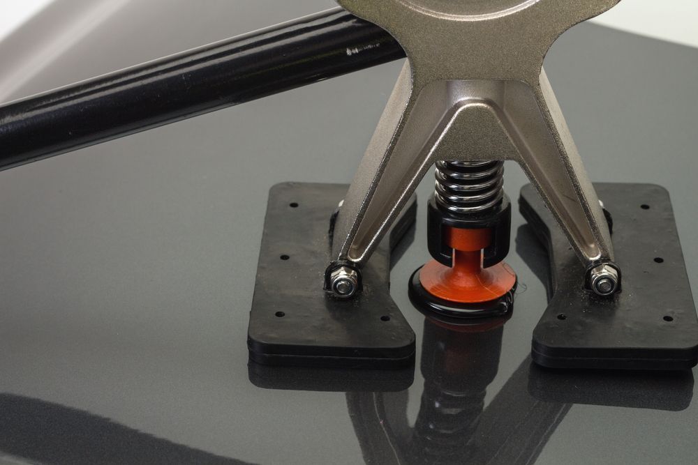 A Close Up of a Tool on a Black Surface — Panel Pro Smash Repairs in Wodonga, VIC