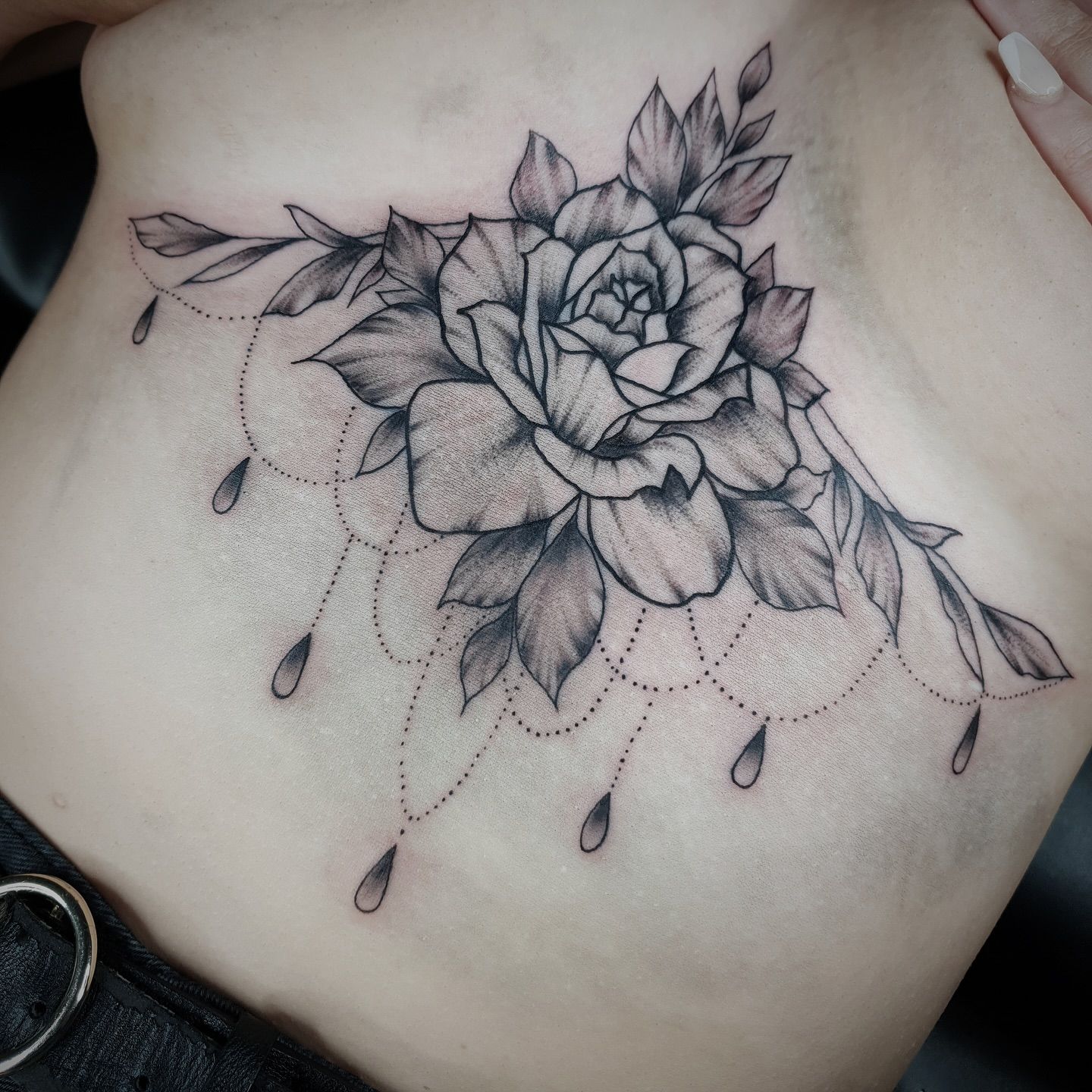 Black and White Floral Sternum Tattoo — Whitsunday Tattooing Airlie Beach in Whitsundays, QLD