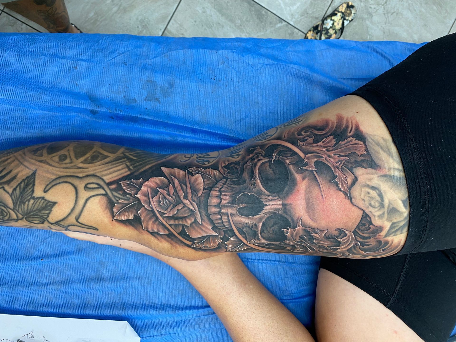 Arm tattoo: skull with roses, shaded details. — Whitsunday Tattooing Airlie Beach in Whitsundays, QLD