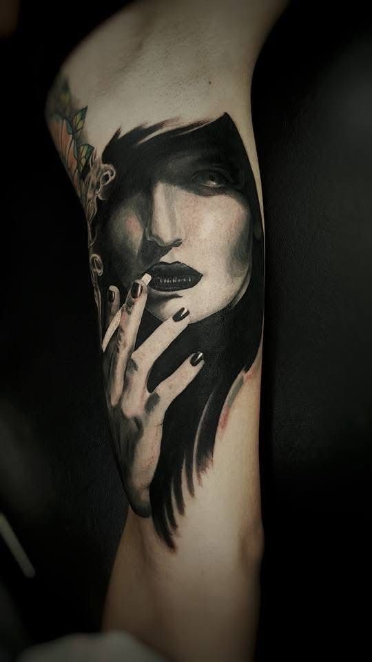 Tattoo of woman smoking cigarette, in black and gray, on a leg. Dark lipstick, nails, hair. — Whitsunday Tattooing Airlie Beach in Whitsundays, QLD