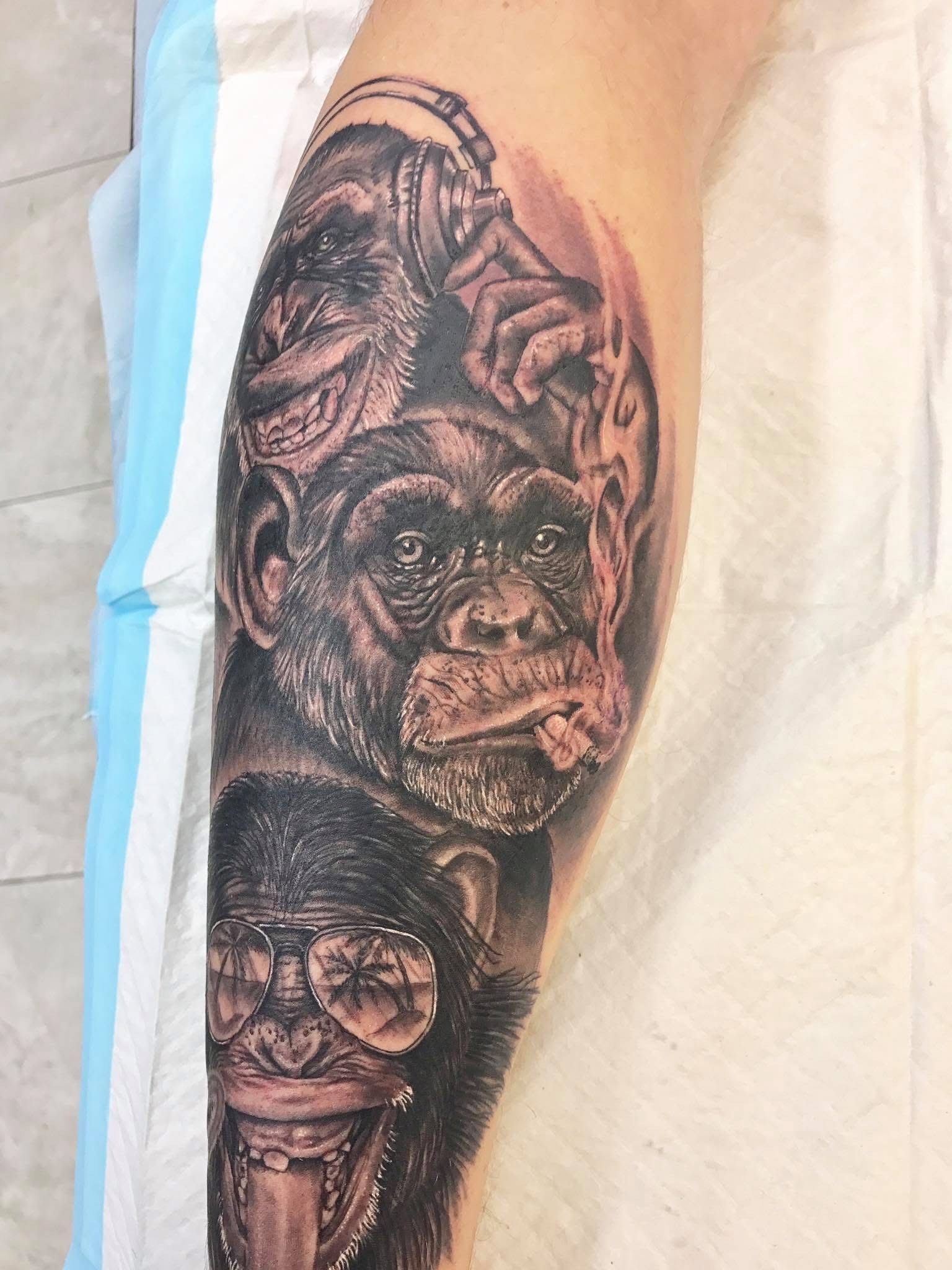 Tattoo of a chimpanzee wearing sunglasses and smoking a cigar. — Whitsunday Tattooing Airlie Beach in Whitsundays, QLD