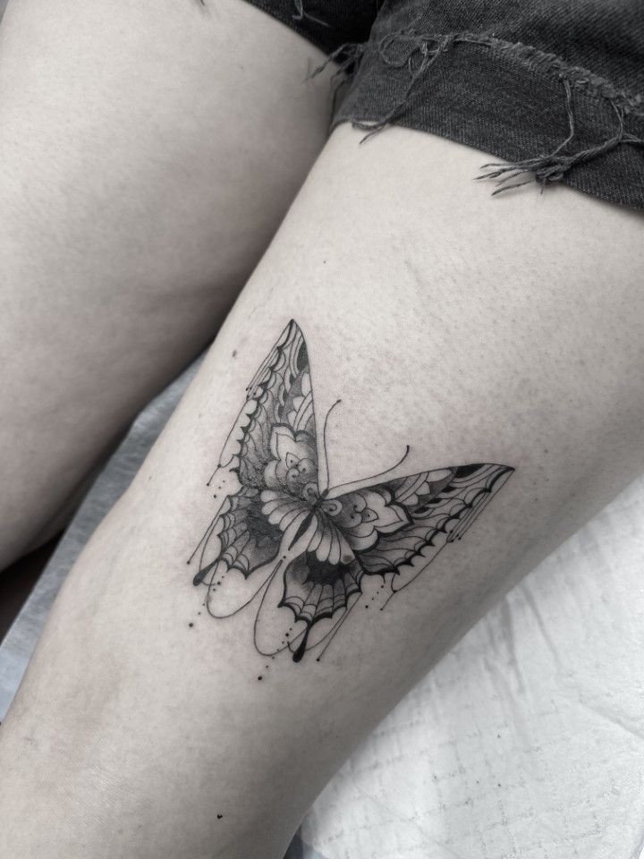 Butterfly tattoo on leg, detailed black ink with watercolor effect. — Whitsunday Tattooing Airlie Beach in Whitsundays, QLD