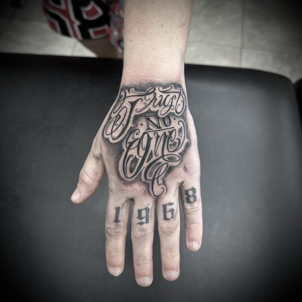 Hand tattoo with