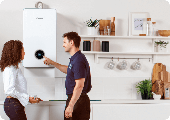 A man is cleaning an air conditioner in a living room.