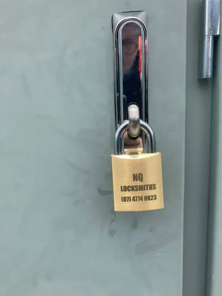 Padlock on A Gray Metal Door — Nq Locksmiths in Charters Towers, QLD