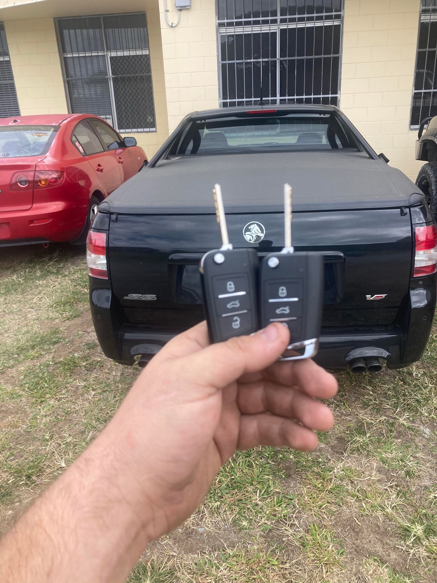 White Locksmith Truck Parked on A Dirt Path in A Wooded Area — Nq Locksmiths In Kirwan, QLD