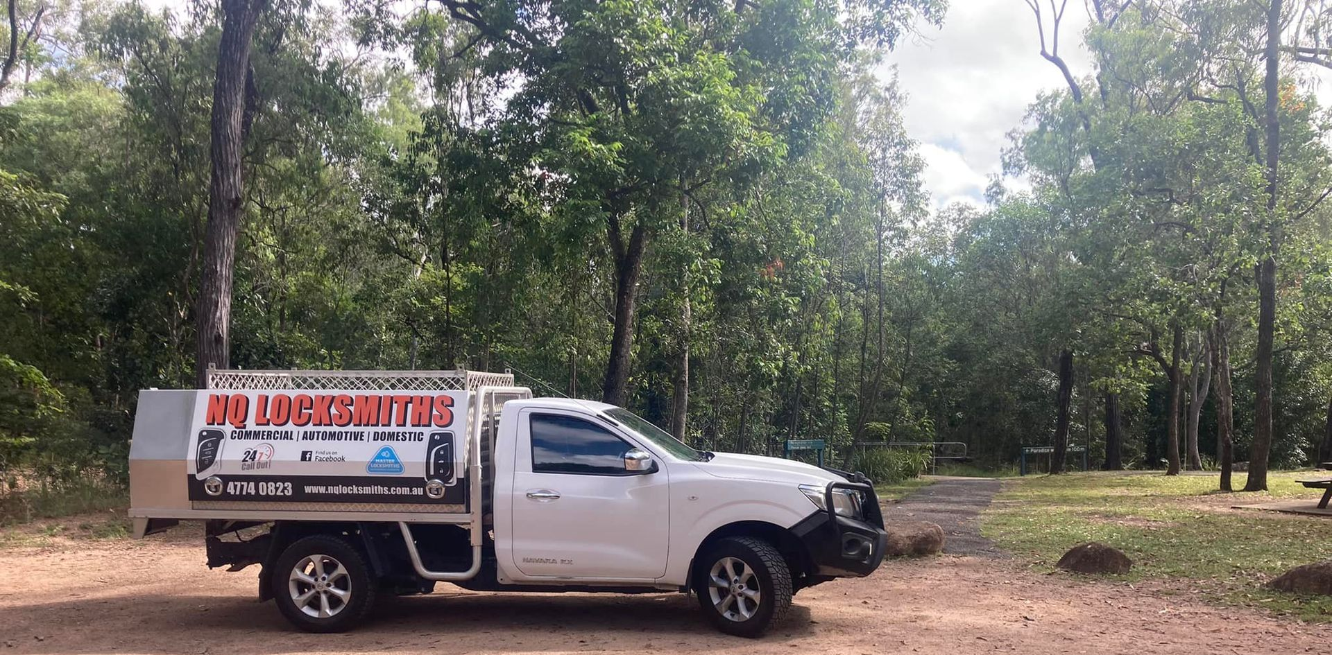 White Window Handle with Keys in The Lock — Nq Locksmiths in Charters Towers, QLD