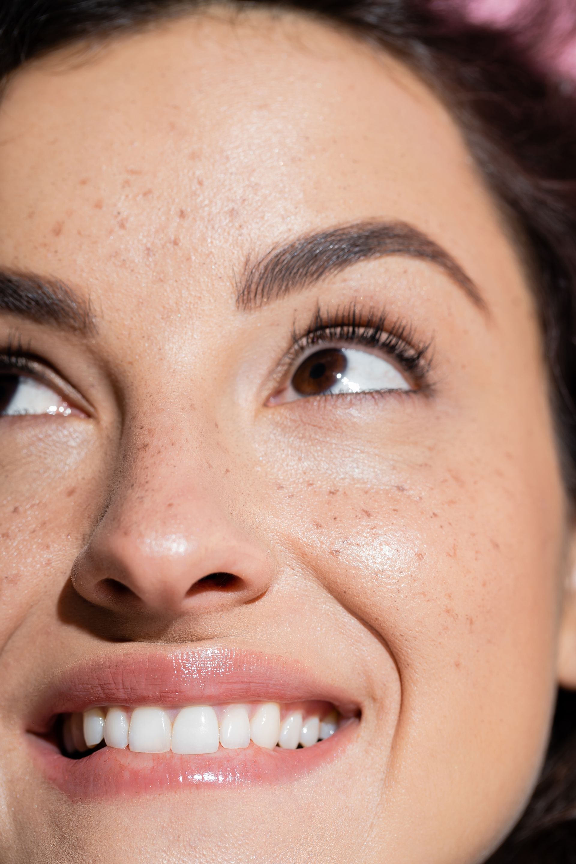 woman touching her face