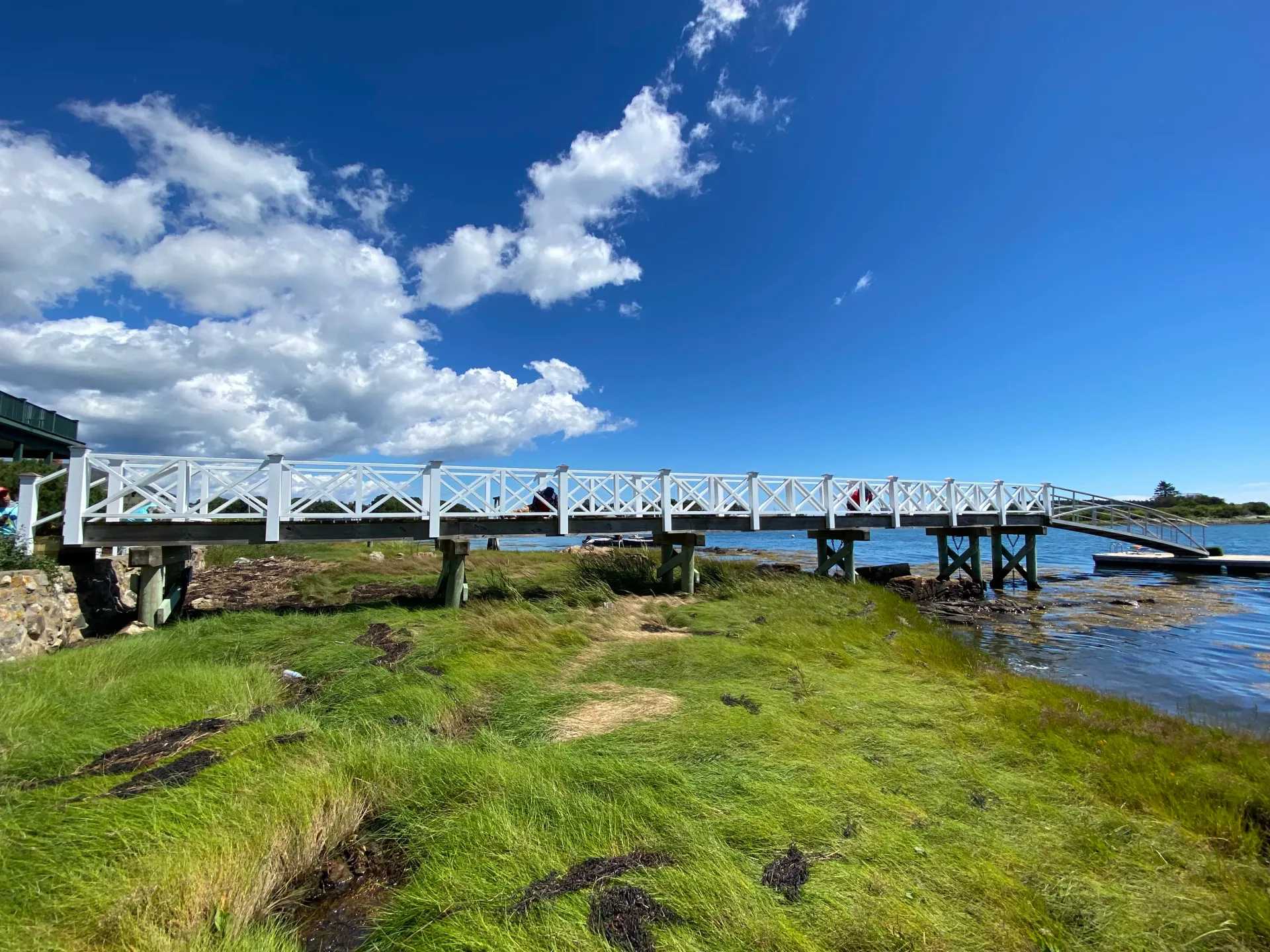 Exterior Deck Painting in Kennebunkport, Maine completed by JM Painting and Home Improvement