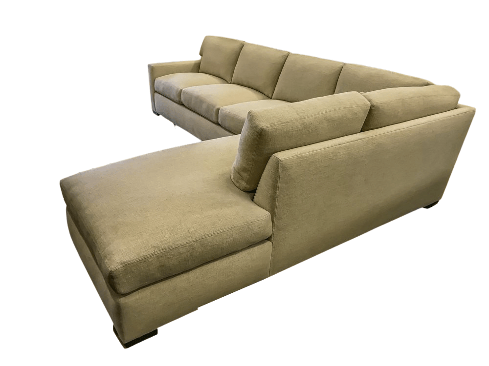 Beige sectional sofa with a chaise lounge, angled view, white background.