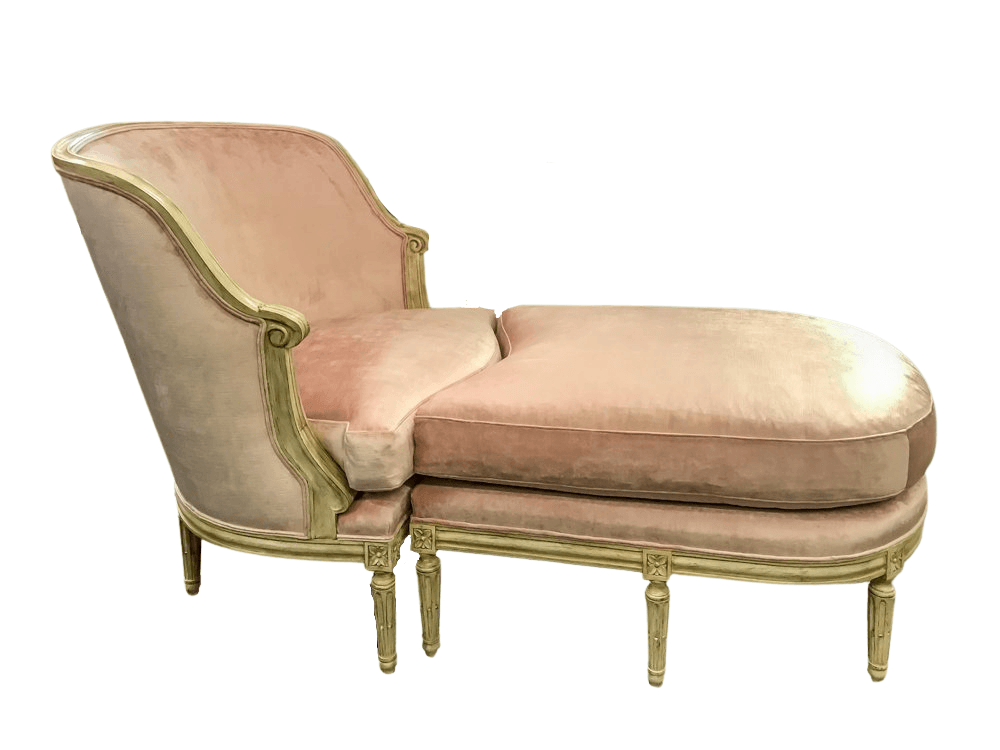 Pink chaise lounge with ornate cream trim.