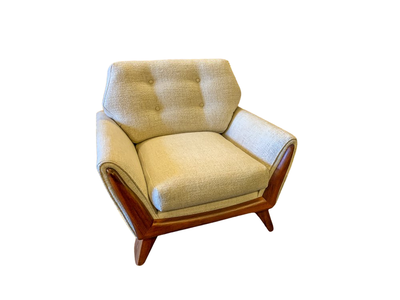 Cream upholstered armchair with wood frame and legs.