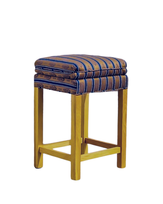 Wooden stool with a cushioned seat featuring blue and brown stripes.