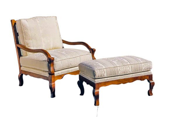 Chair and ottoman with wood frame, cream patterned upholstery.