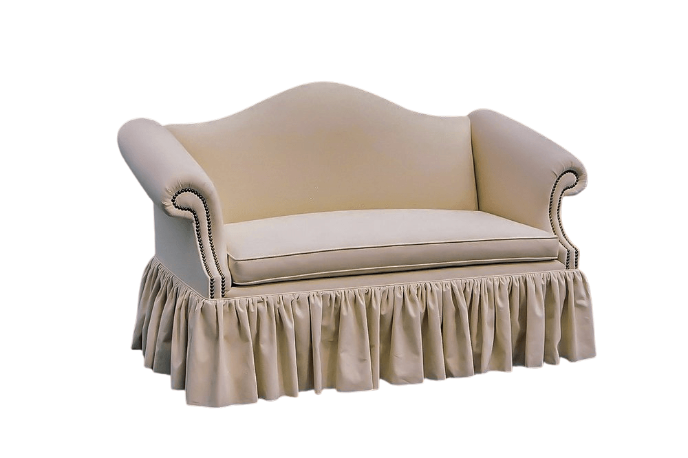 Cream-colored loveseat with curved back and skirted base.