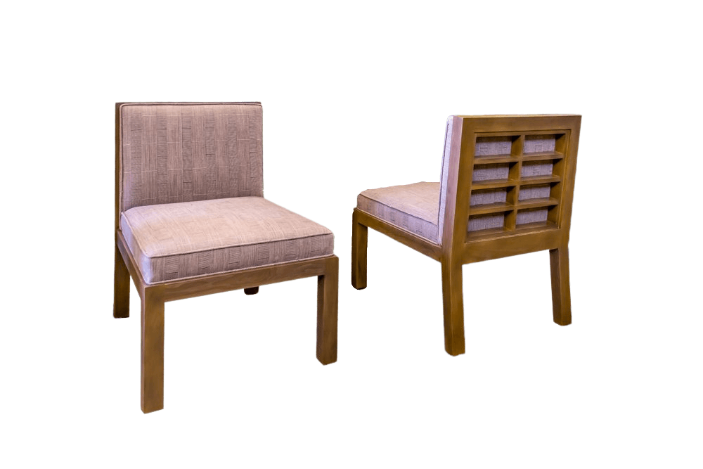 Two wooden chairs with beige upholstered seats and backs, one with an open-grid back.