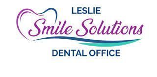 The logo for leslie smile solutions dental office.