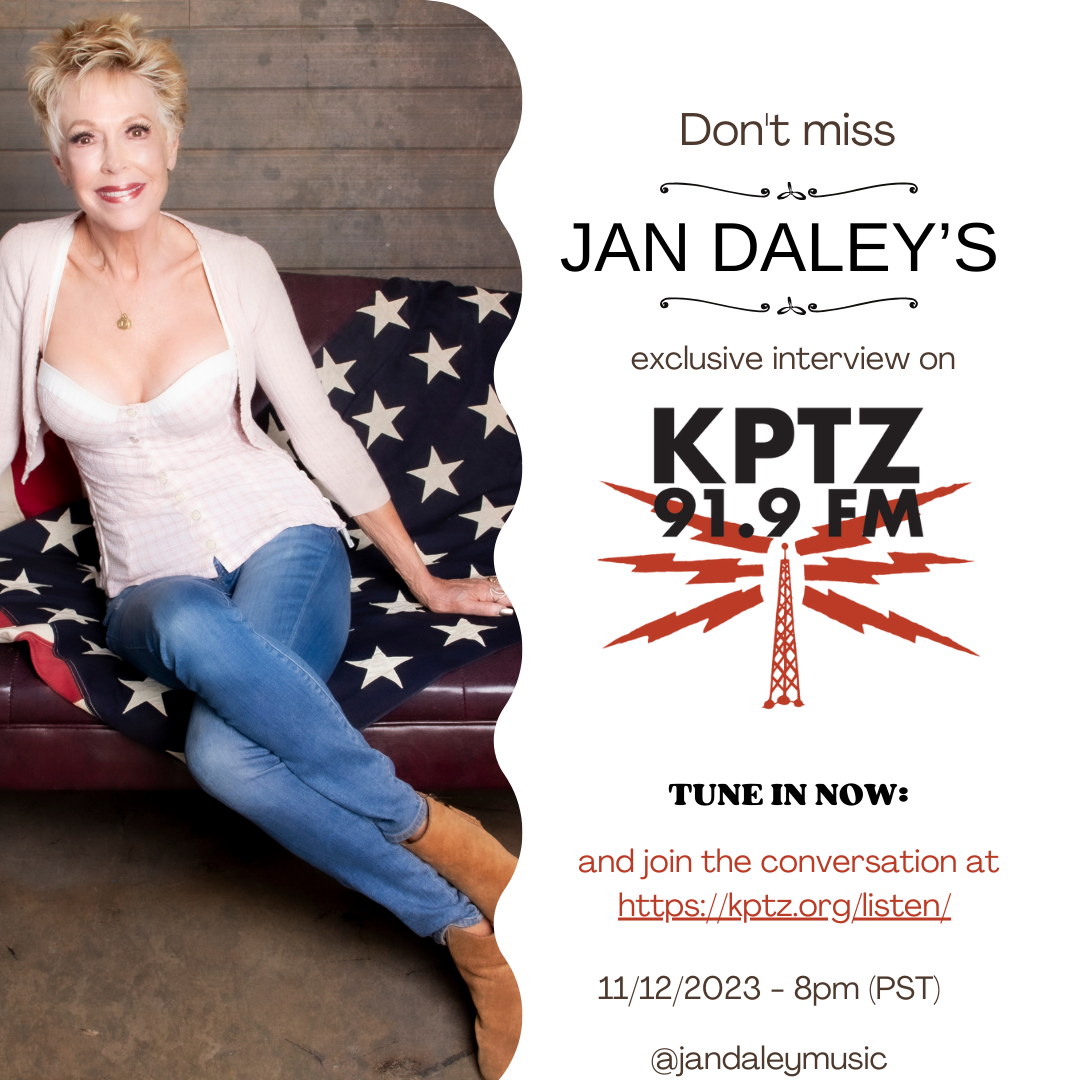 A woman is sitting on a couch with an advertisement for kptz 91.9 fm