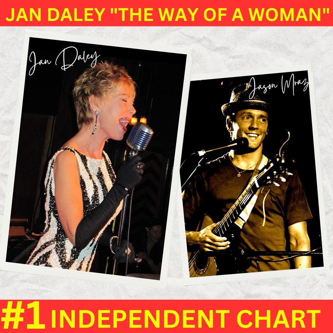 A woman singing into a microphone next to a man playing a guitar