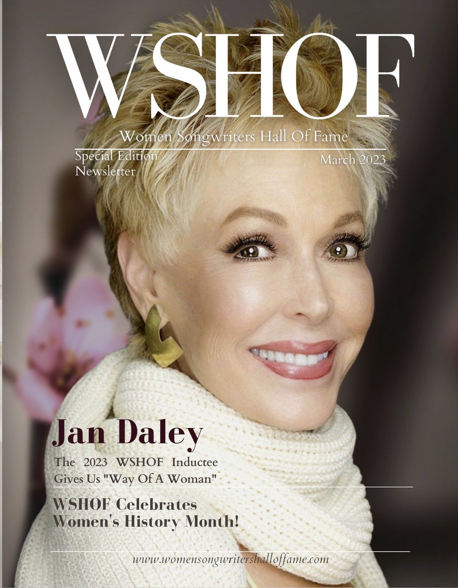 A woman is smiling on the cover of a magazine.