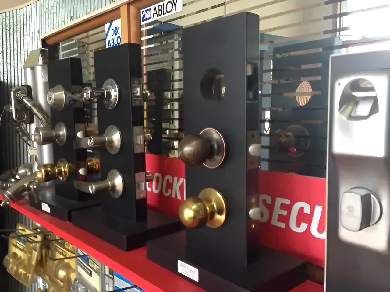 A Bunch Of Door Knobs Are On Display In A Store — Locksolid Security Locksmiths in Grafton, NSW