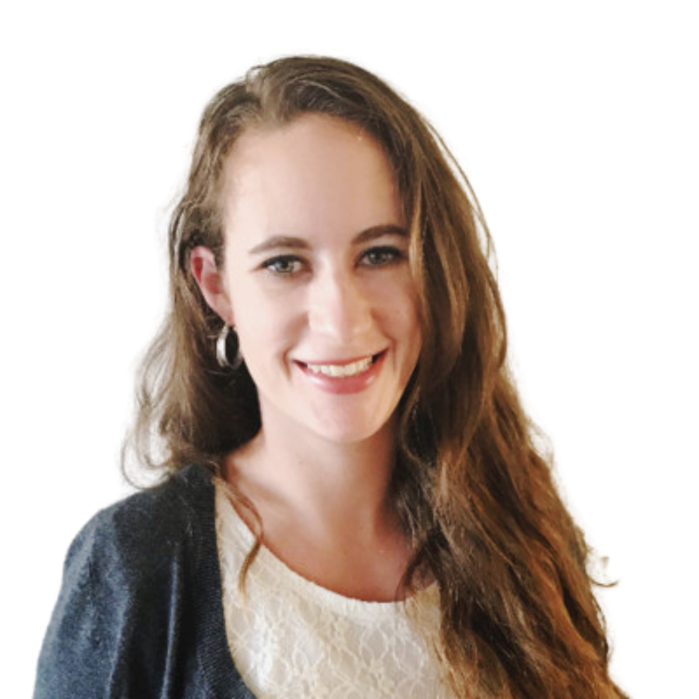 A woman with long brown hair is smiling for the camera