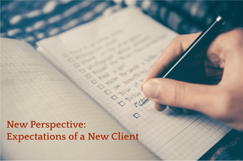 A person is writing in a notebook with the words new perspective expectations of a new client