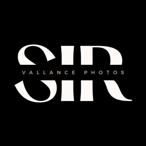 A white logo on a black background that says alliance photos