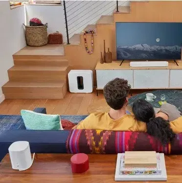 Couple Watching TV With Sonos Sound System — Superior Wifi in East Ballina, NSW