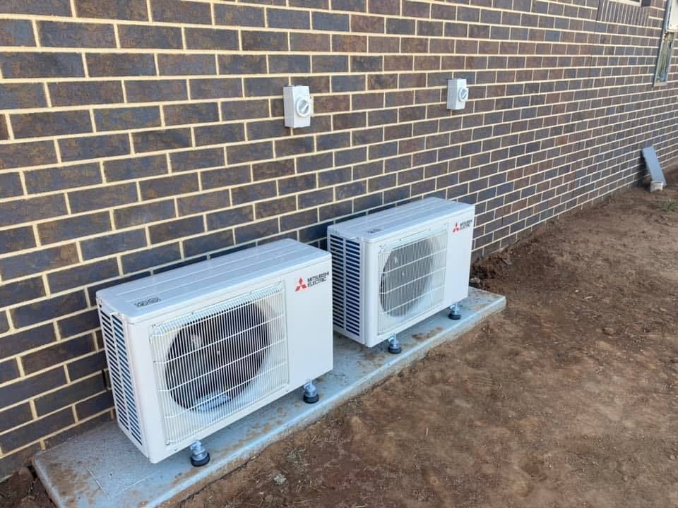 Air-Conditioning Outdoor Unit Installed — Electrician in Central West