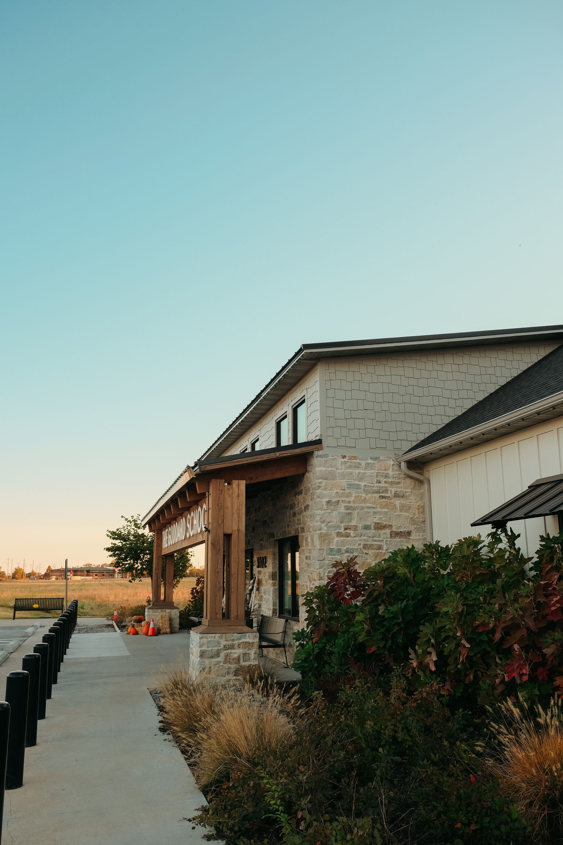 A close up of a stone wall with different colored bricks
