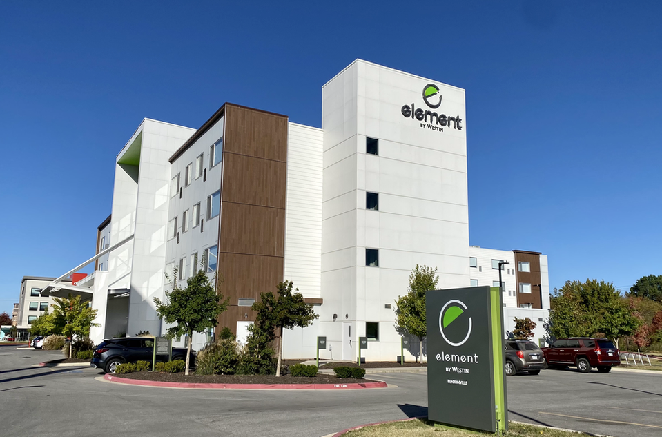 A large white building with the word element on it