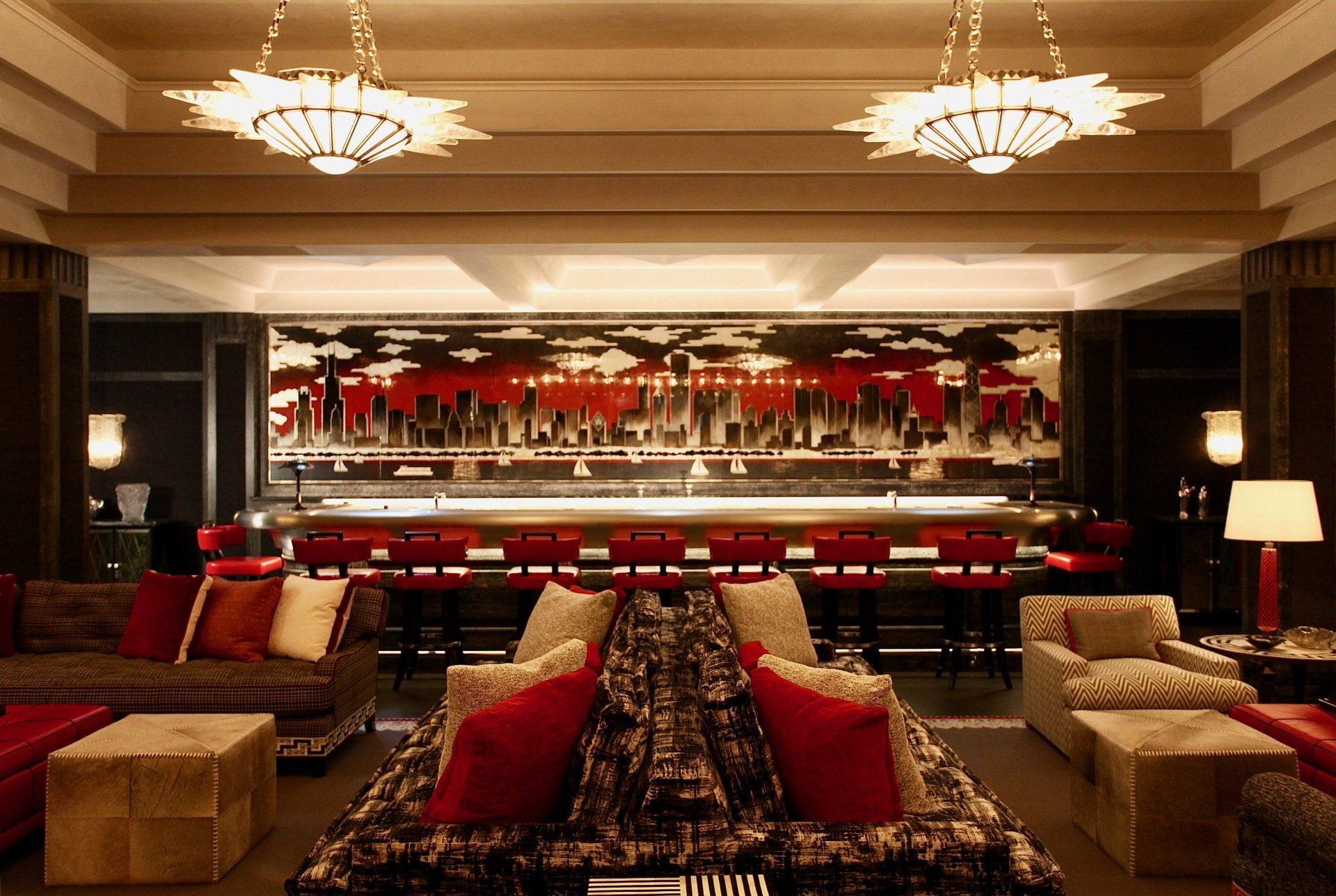 A living room with lots of furniture and a bar