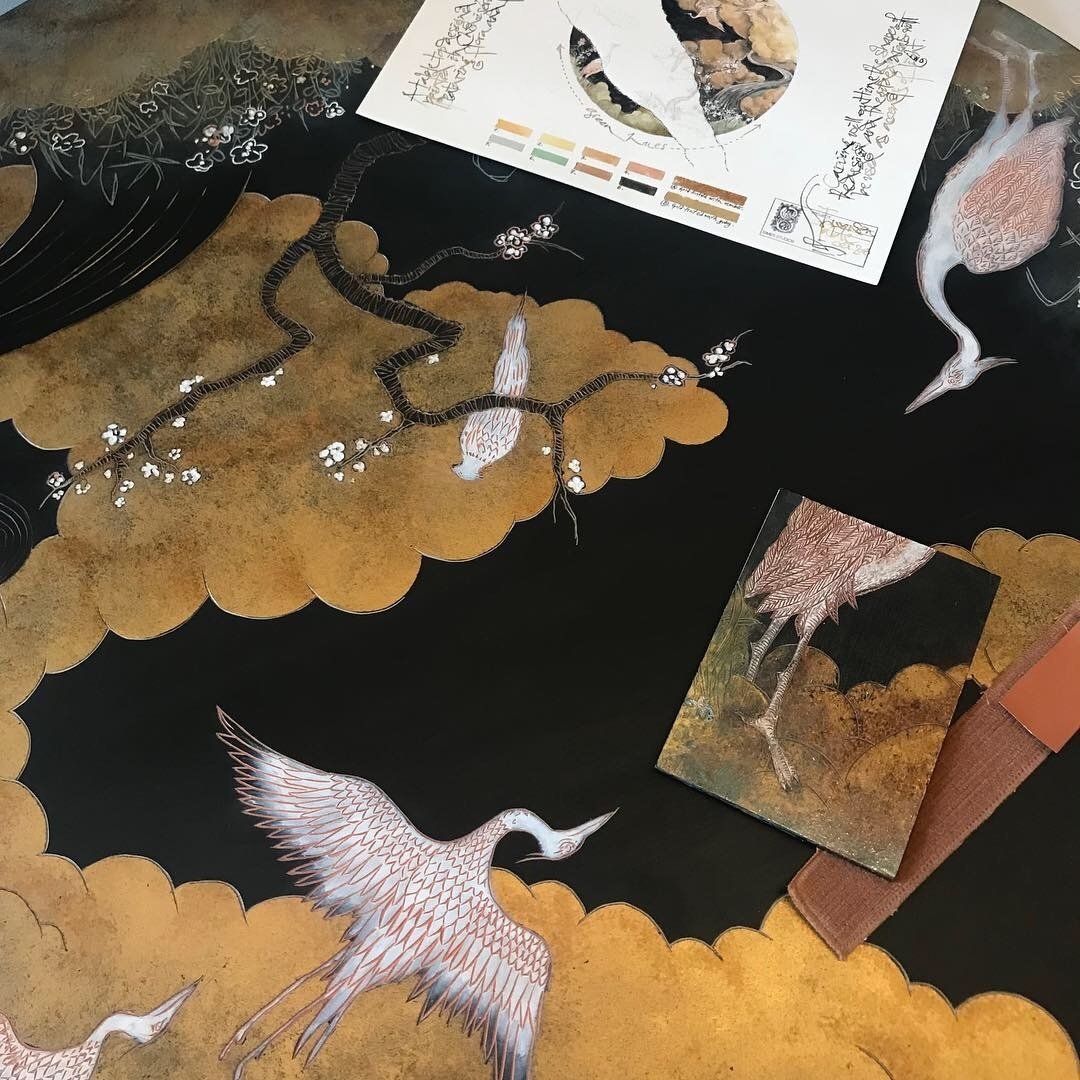 A painting of birds and clouds on a black background