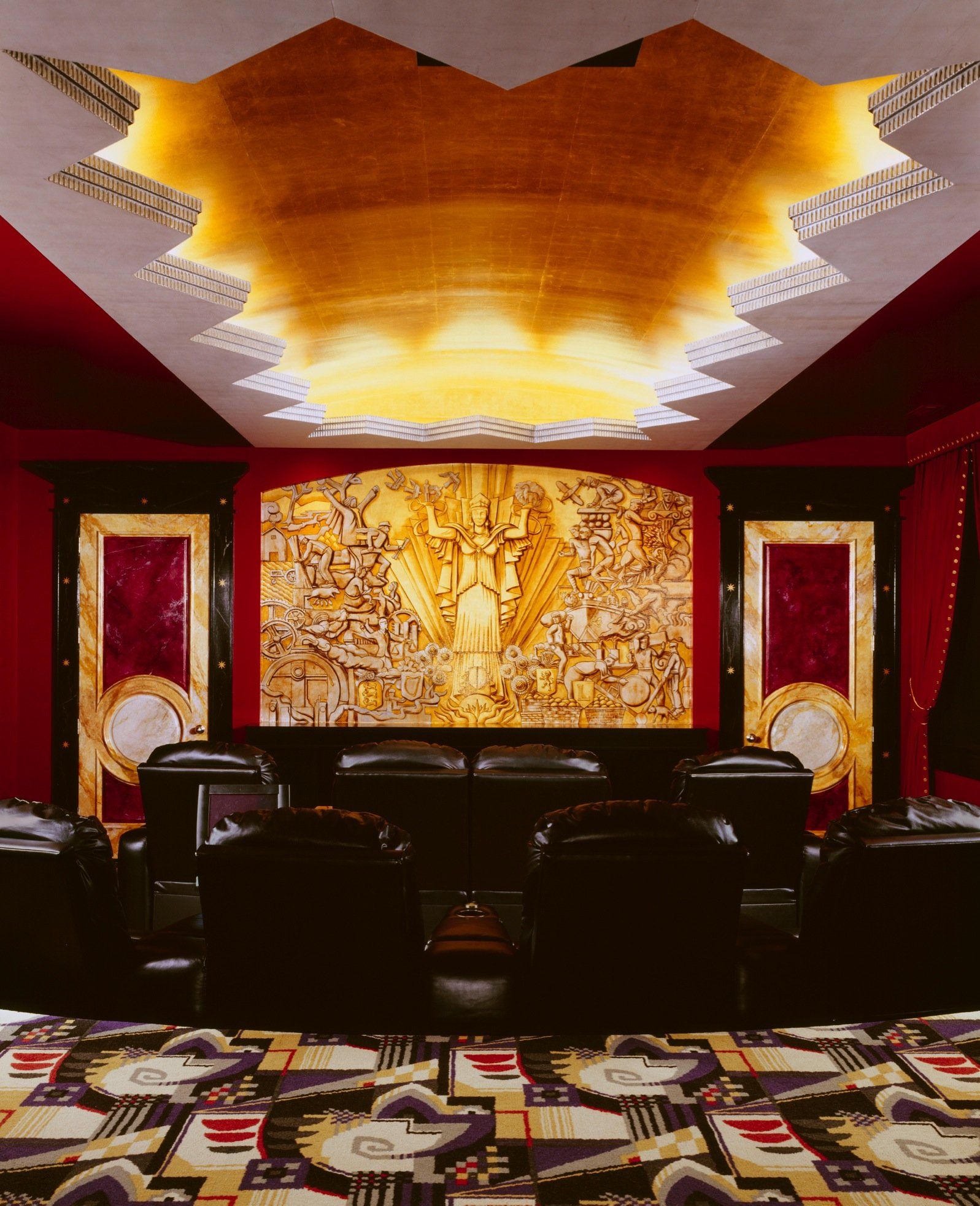 A room with a large painting on the wall