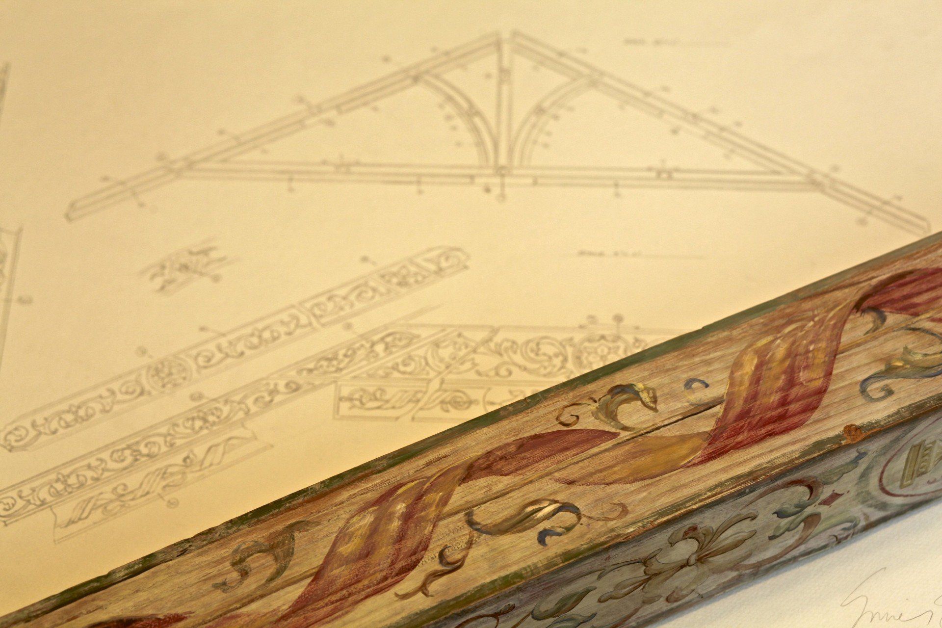 A close up of a piece of wood with a drawing on it.