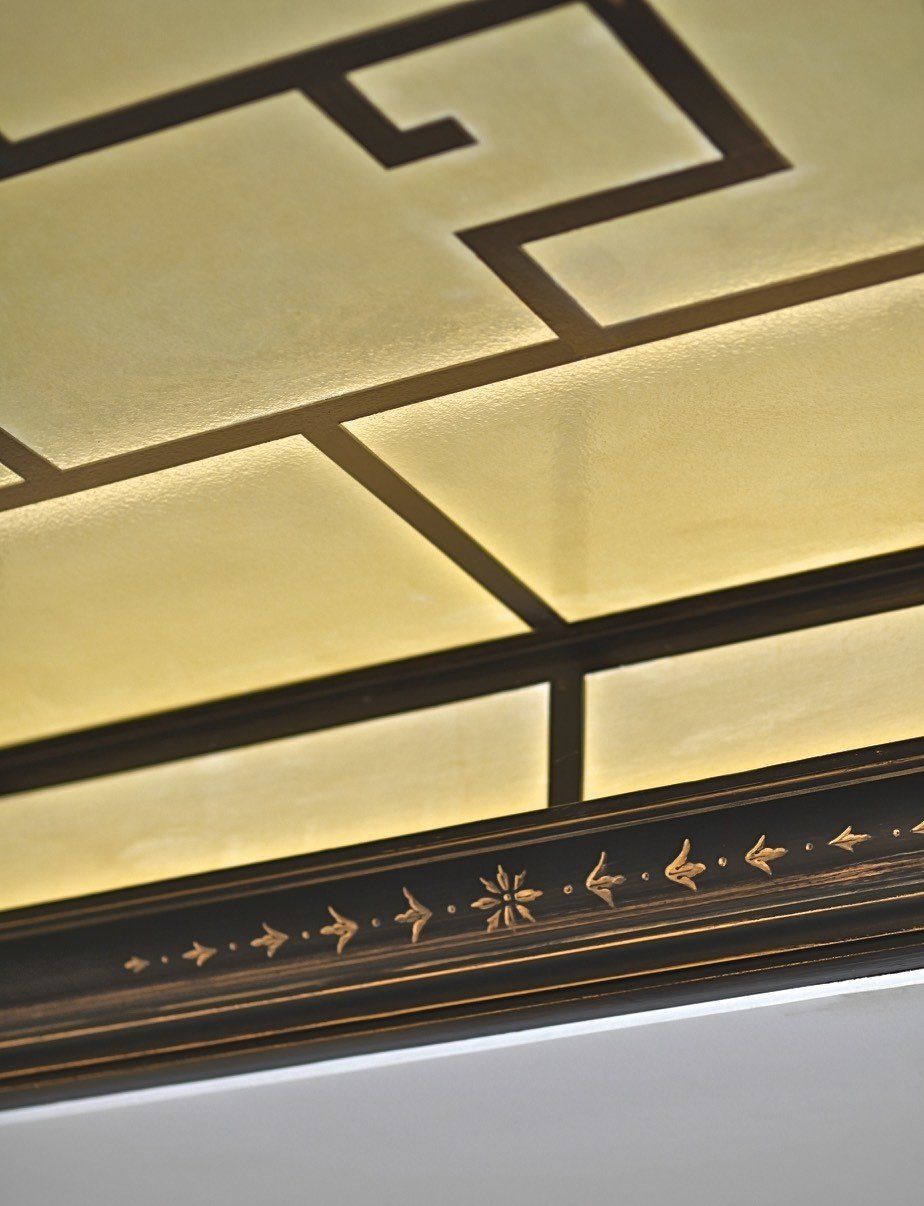 A picture frame with a geometric design on it