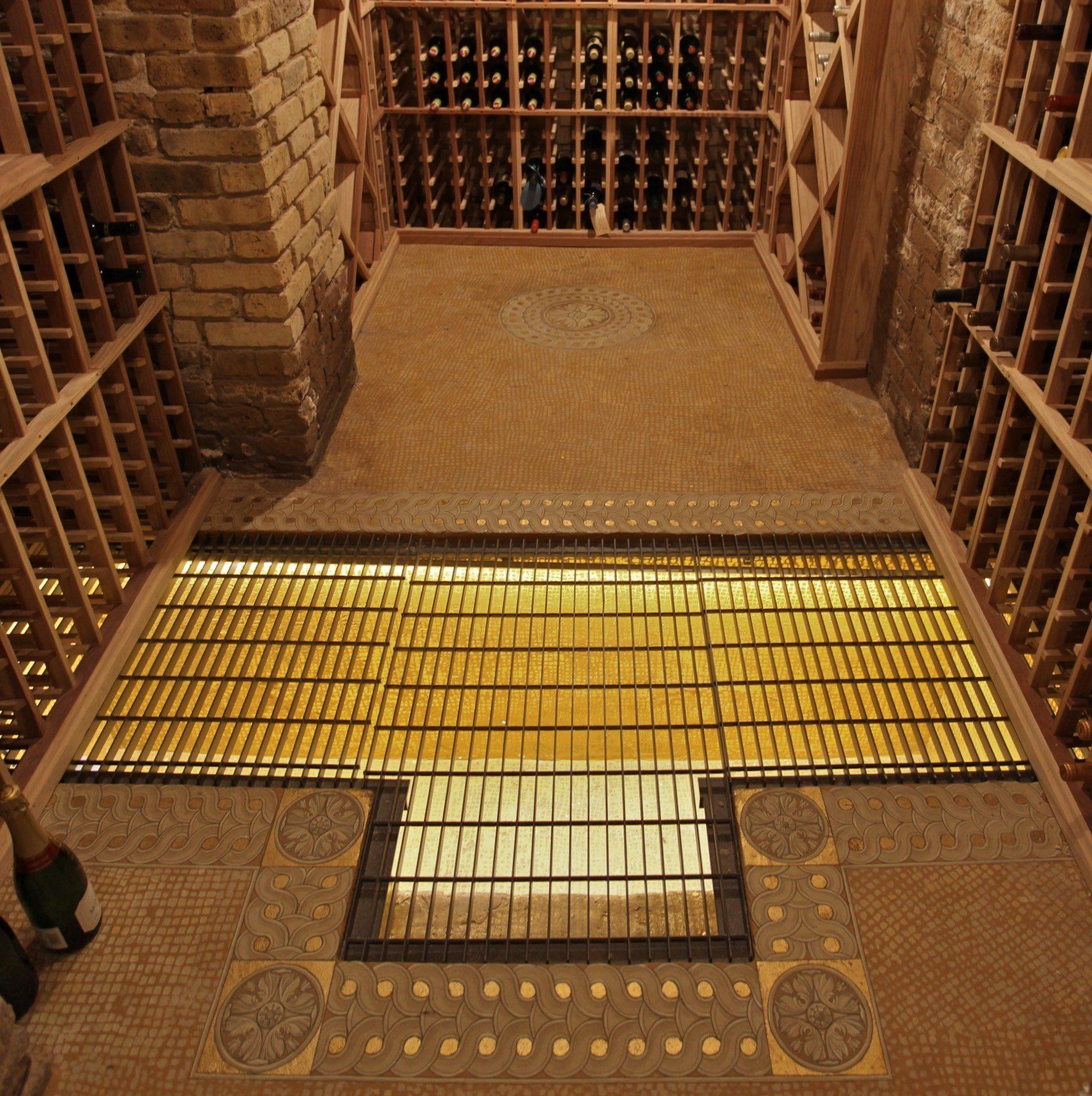 A wine cellar with lots of shelves and bottles