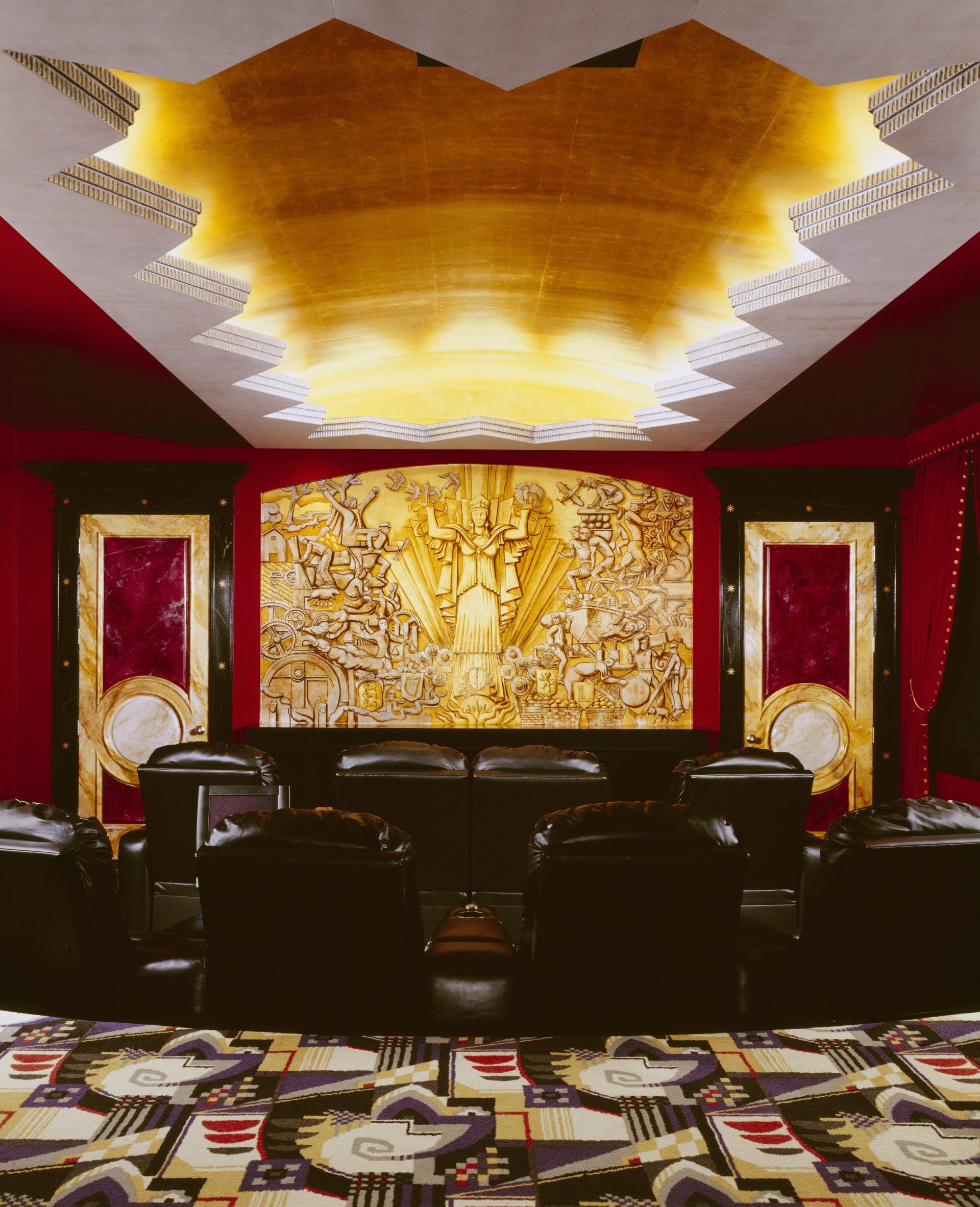 A room with a large painting on the wall