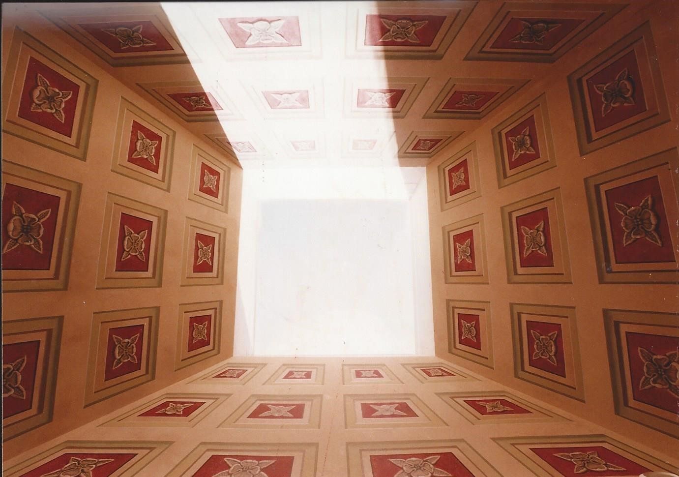 A room with a lot of squares on the walls