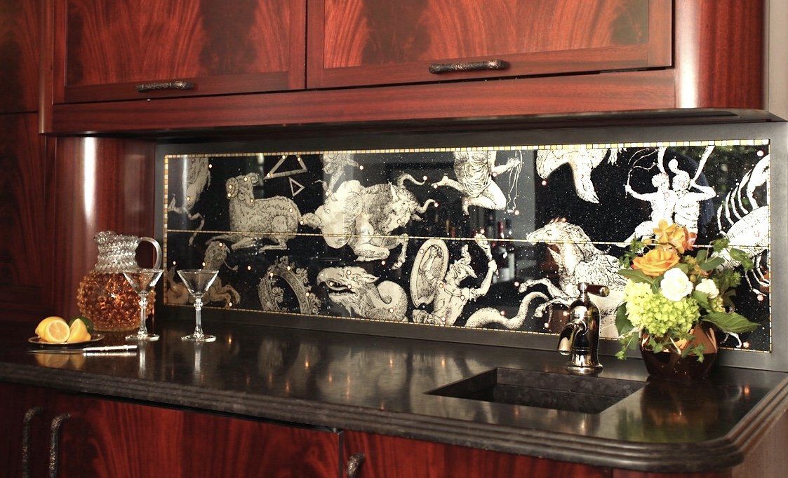A kitchen counter with a sink and a vase of flowers