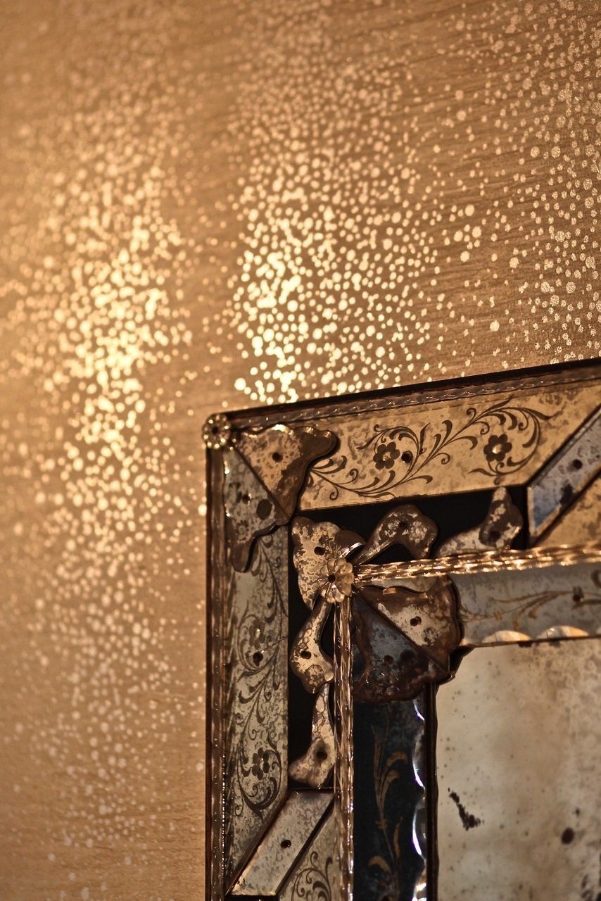 A close up of a picture frame on a wall