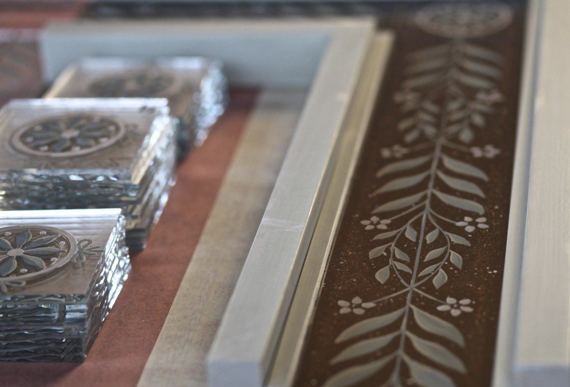 A picture frame with a floral design on it