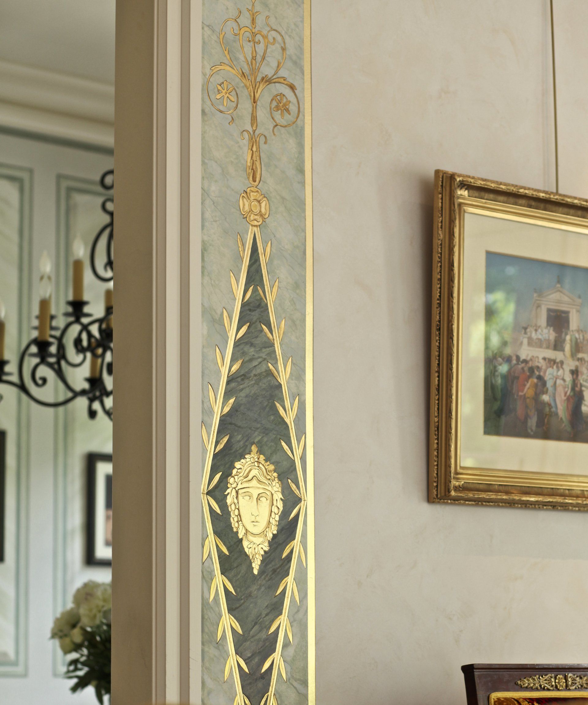 A picture of a building is hanging on a wall