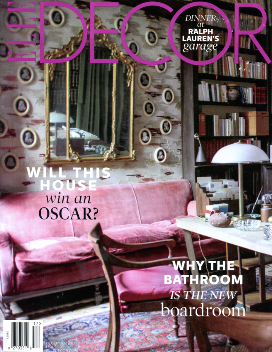 A pink couch is on the cover of a magazine