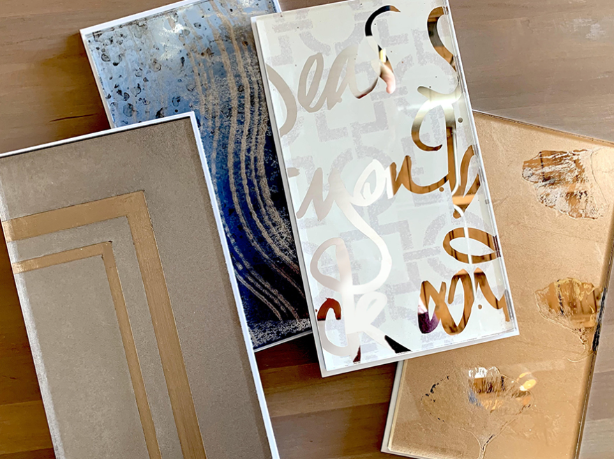 A group of cards are sitting on top of each other on a wooden table.