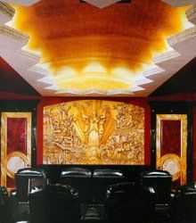 A room with a painting on the wall and a ceiling