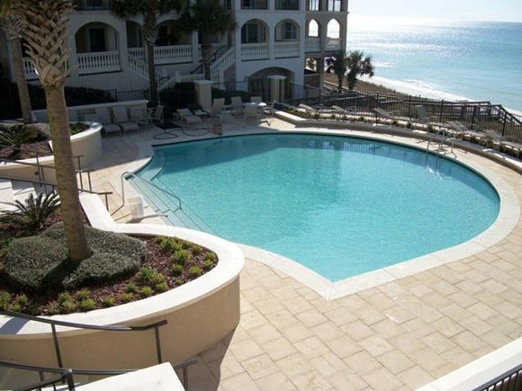 Man cleaning pool — Pool & Patio Services in Fort Walton Beach, FL